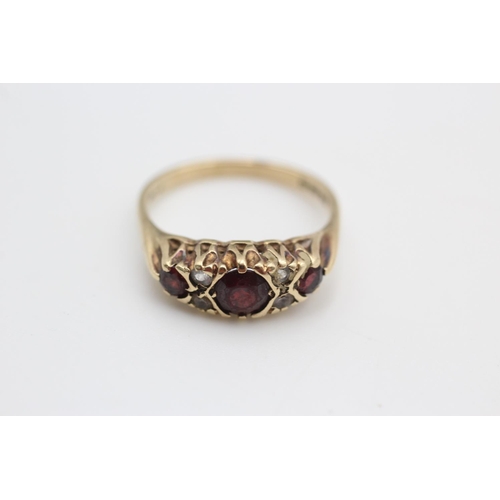 302 - 2 x 9ct gold garnet rings size J and size P