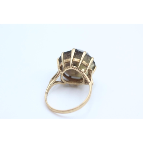 305 - 9ct Gold smoky quartz cocktail ring size O