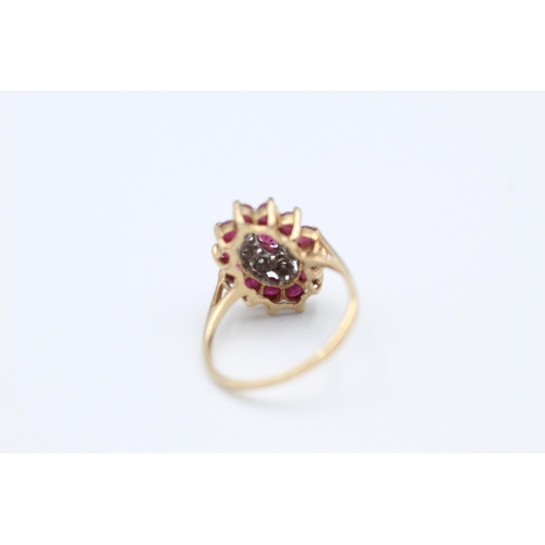 324 - 9ct gold ruby and diamond cluster dress ring size K