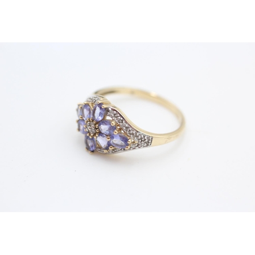 340 - 14ct gold iolite and diamond floral cluster ring size T