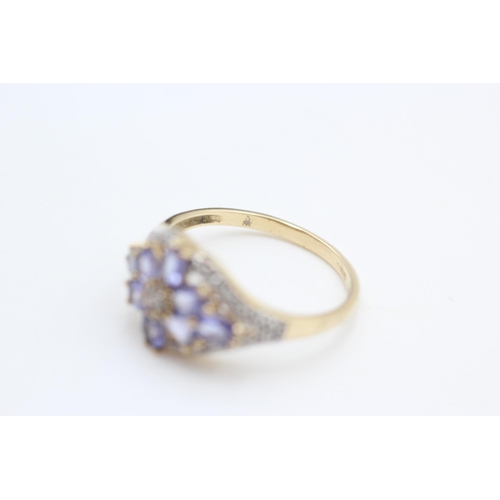 340 - 14ct gold iolite and diamond floral cluster ring size T