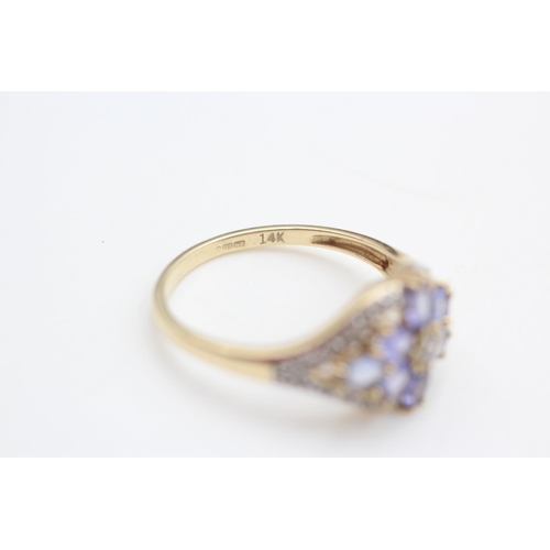 340 - 14ct gold iolite and diamond floral cluster ring size T