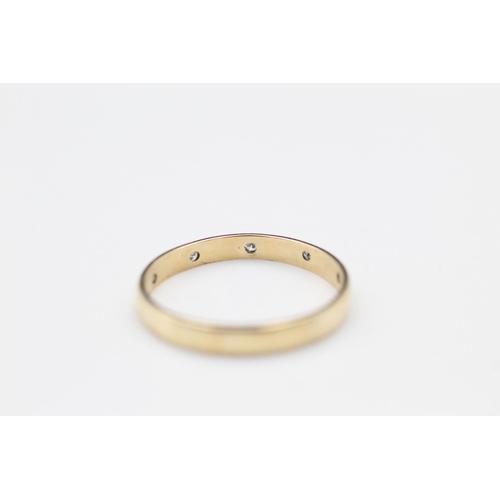 354 - 9ct gold diamond set band ring size P