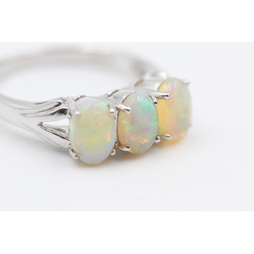 357 - 9ct gold jelly opal trilogy ring size N