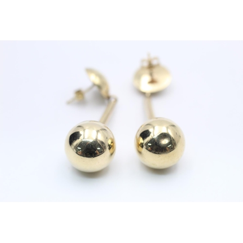 372 - gold modernist style ball motif drop earrings