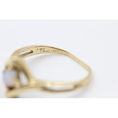 391 - 14ct gold opal geometric twist ring size M