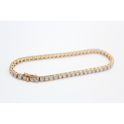 395 - 14ct gold gemstone tennis link bracelet
8.4g