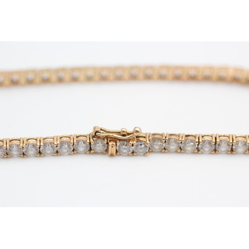 395 - 14ct gold gemstone tennis link bracelet
8.4g