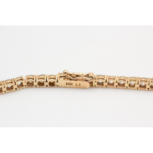 395 - 14ct gold gemstone tennis link bracelet
8.4g