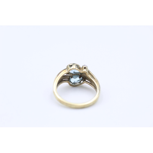 50 - 9ct Gold blue topaz & diamond stylised ring size N 3g