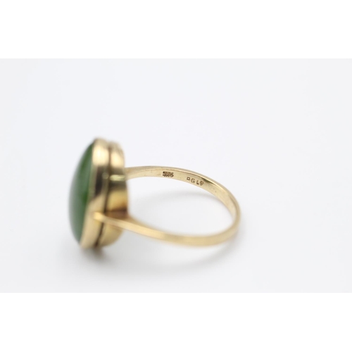 53 - 9ct gold nephrite ring size O
3.6g