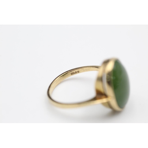 53 - 9ct gold nephrite ring size O
3.6g