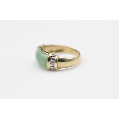 59 - 9ct Gold jade & diamond detail ring size N
3.1g