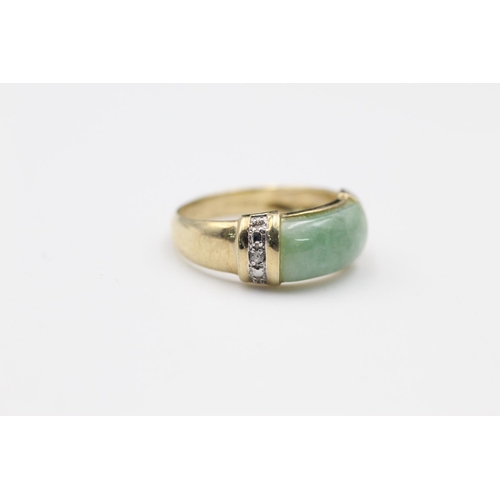 59 - 9ct Gold jade & diamond detail ring size N
3.1g