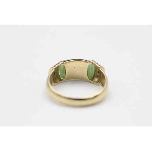 59 - 9ct Gold jade & diamond detail ring size N
3.1g