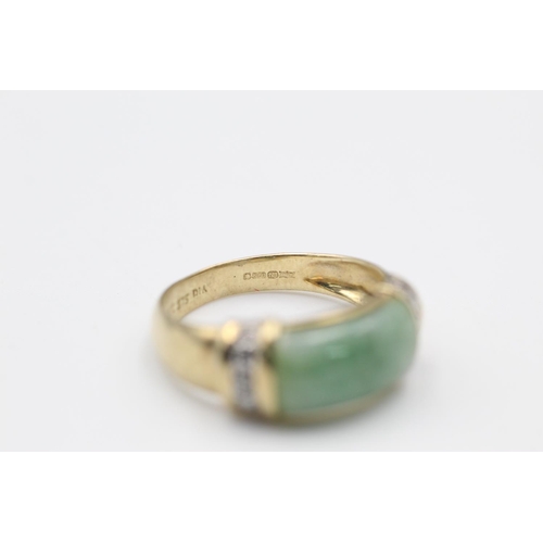 59 - 9ct Gold jade & diamond detail ring size N
3.1g