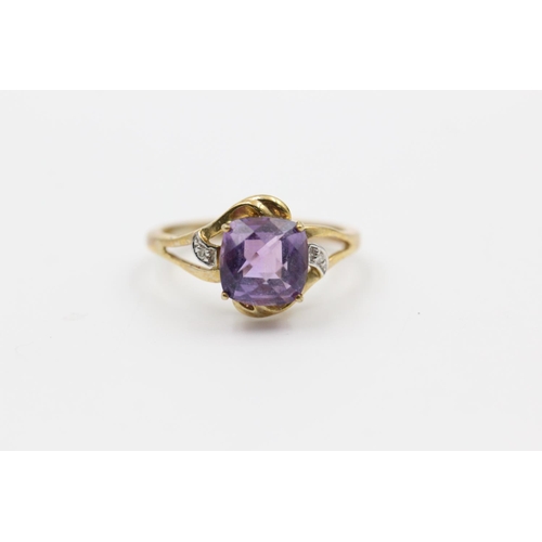 63 - 9ct gold amethyst and diamond dress ring size N
2.5g