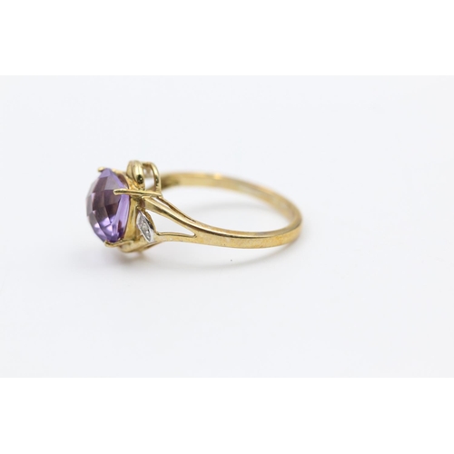 63 - 9ct gold amethyst and diamond dress ring size N
2.5g