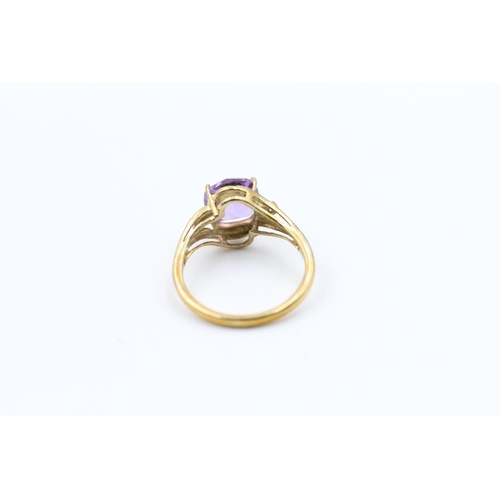 63 - 9ct gold amethyst and diamond dress ring size N
2.5g