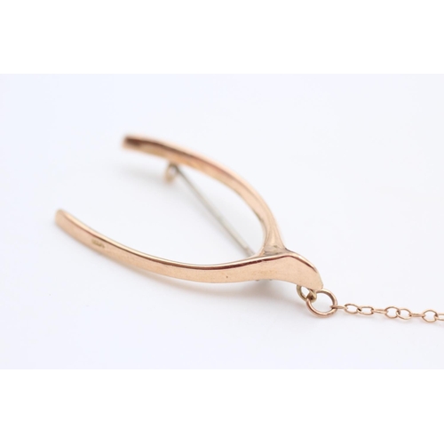 67 - 9ct Gold true vintage wishbone brooch