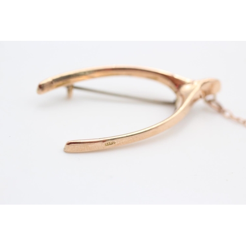 67 - 9ct Gold true vintage wishbone brooch