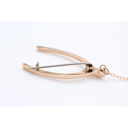 67 - 9ct Gold true vintage wishbone brooch