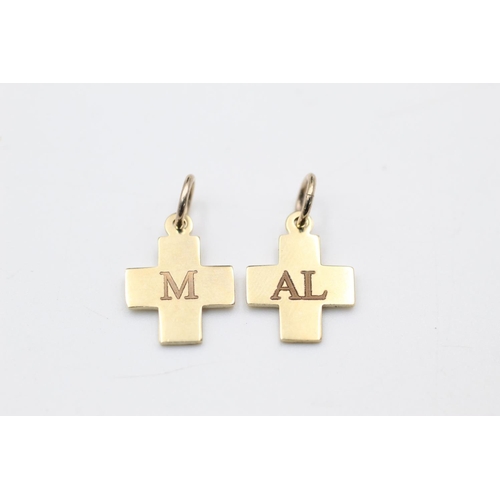 81 - 9ct pin with charms by Vounakis