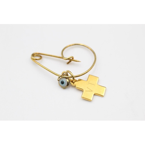 81 - 9ct pin with charms by Vounakis