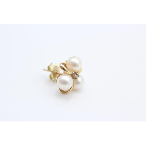 85 - 14ct gold pearl and diamond stud earrings