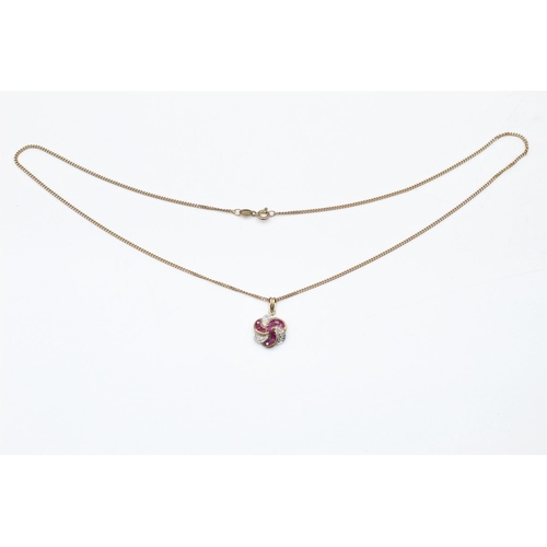 90 - 9ct Gold ruby & diamond swirl pendant necklace