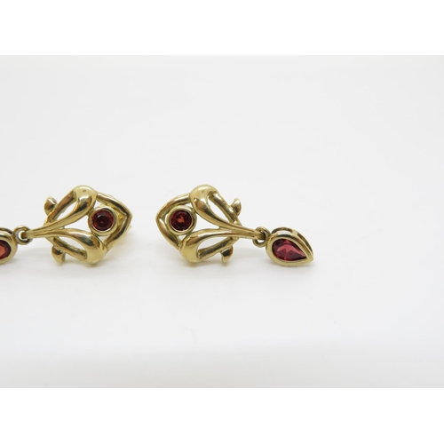 398 - 2x 9ct earrings with red stones 2.1g