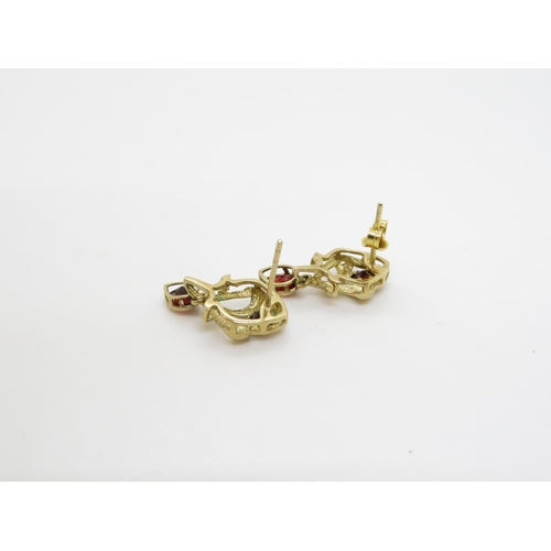 398 - 2x 9ct earrings with red stones 2.1g