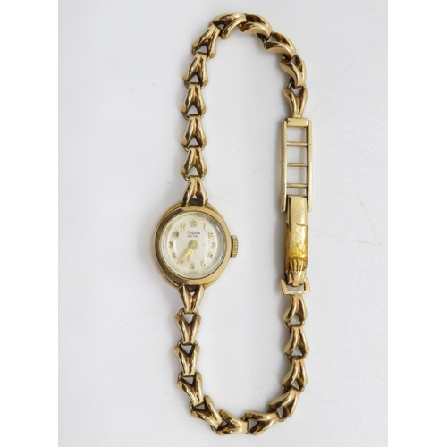 283 - 9ct gold Tudor Royale Rolex strap and case Tudor movement 15mm head 13.6g