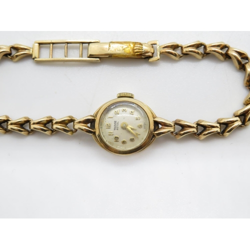 283 - 9ct gold Tudor Royale Rolex strap and case Tudor movement 15mm head 13.6g