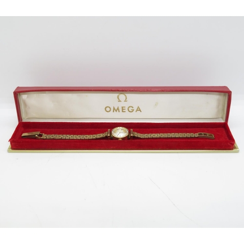 293 - Boxed 14ct ladies Omega watch with 9ct bracelet working total weight 22.6g