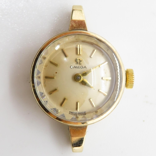 294 - 9ct ladies Omega watch 8.1g 15mm head watch runs