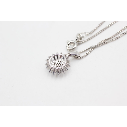 10 - 9ct white gold diamond pave set snowflake pendant necklace (2.7g)