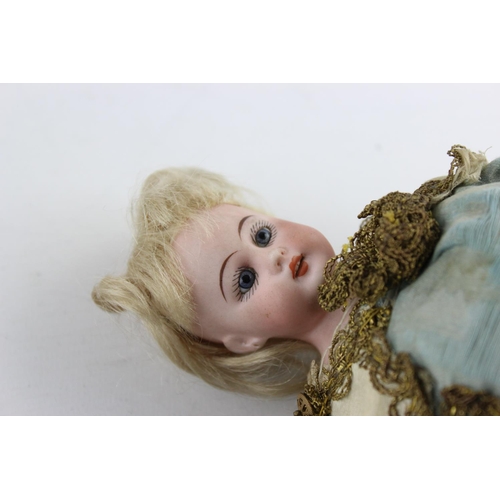 140 - Antique Bisque Head Musical Marotte Doll with Bone Whistle Handle