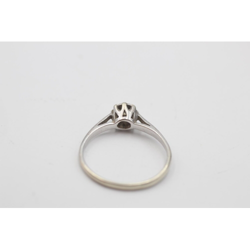 4 - 9ct white gold diamond solitaire ring (1.6g) Size N