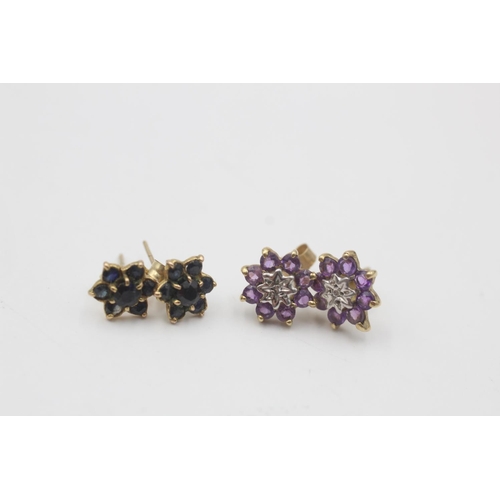 66 - 2 x 9ct gold stud earrings inc. sapphire, diamond, amethyst (2.1g)