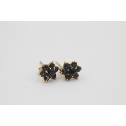 66 - 2 x 9ct gold stud earrings inc. sapphire, diamond, amethyst (2.1g)