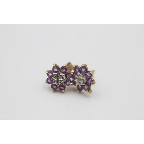 66 - 2 x 9ct gold stud earrings inc. sapphire, diamond, amethyst (2.1g)