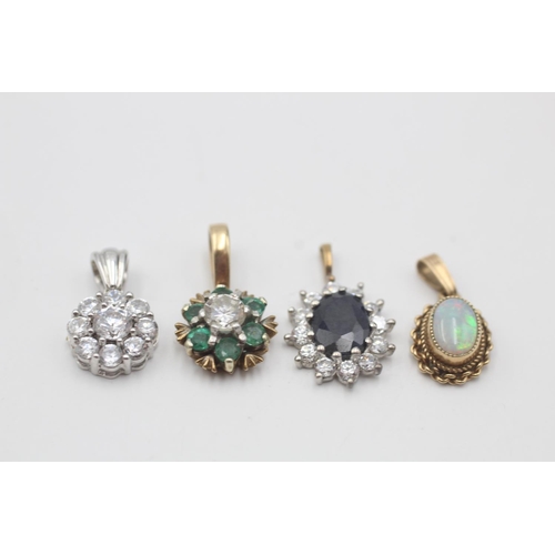 68 - 4 x 9ct yellow and white gold gemstone pendants inc. emerald, opal, sapphire & clear gemstone (4.5g)