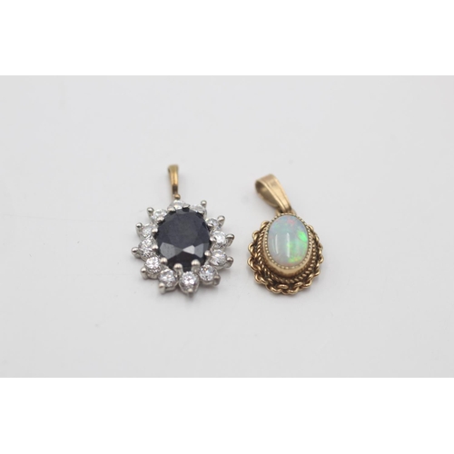 68 - 4 x 9ct yellow and white gold gemstone pendants inc. emerald, opal, sapphire & clear gemstone (4.5g)