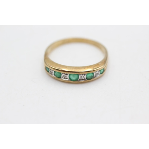 69 - 9ct gold emerald & diamond nine stone gypsy setting ring (2g)  Size N