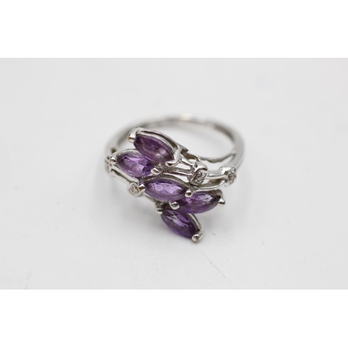 11 - 9ct white gold amethyst & diamond overlapping floral setting dress ring (2.3g) Size K