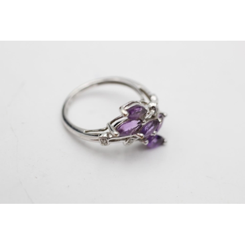 11 - 9ct white gold amethyst & diamond overlapping floral setting dress ring (2.3g) Size K
