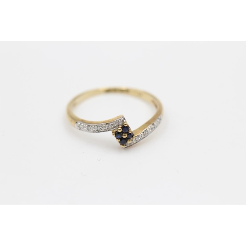 14 - 9ct gold diamond & sapphire twist ring (1.9g) Size R