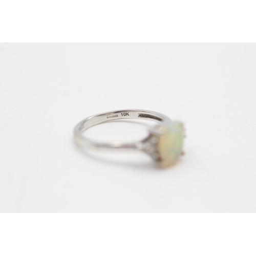 18 - 9ct white gold opal fancy ring (1.8g) Size J