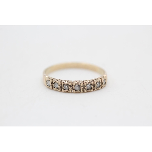 24 - 9ct gold diamond seven stone half eternity ring (1.7g) Size Q